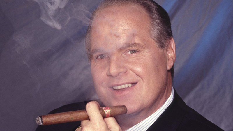 Rush Limbaugh enjoying a cigar