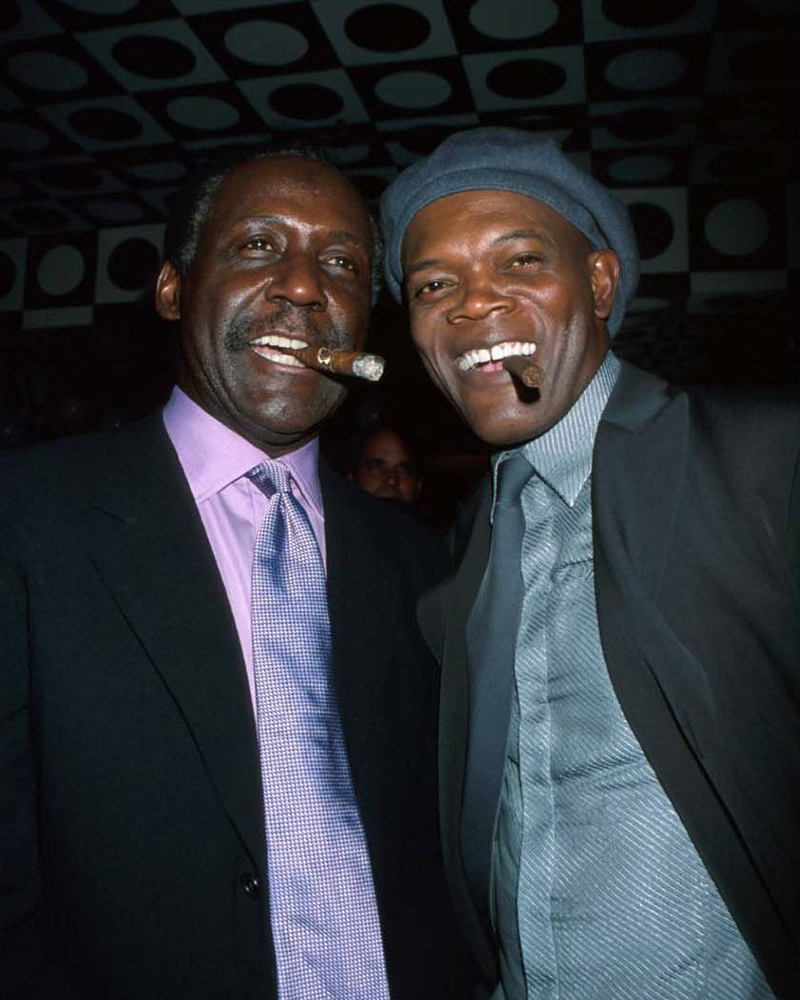 Samuel L Jackson and Richard Roundtree both smoking cigars at film premiere