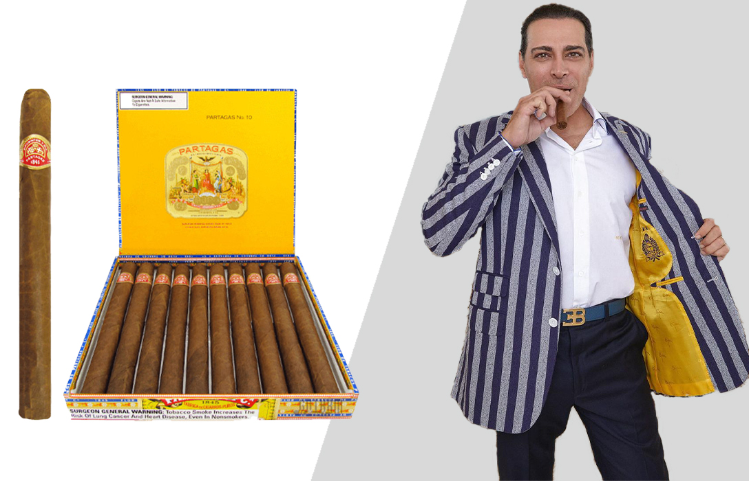 Manny Khoshbin smokes Partagas cigar
