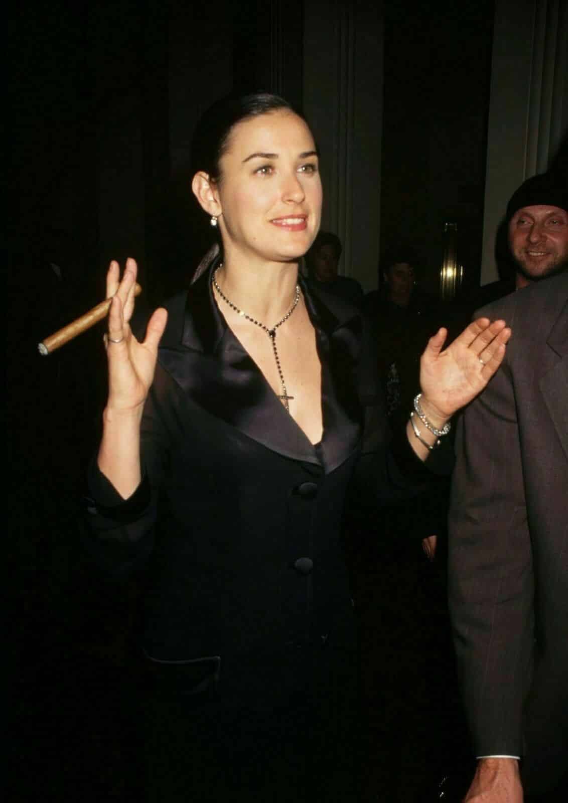 Demi Moore smoking a cigar
